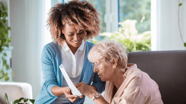 Nurseplus carer helping elderly woman. Elderly care in Andover